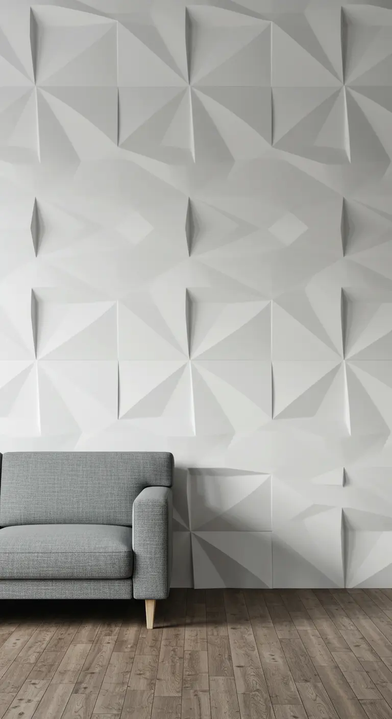 Mur blanc habillé de panneaux décoratifs 3D avec un motif géométrique en relief.